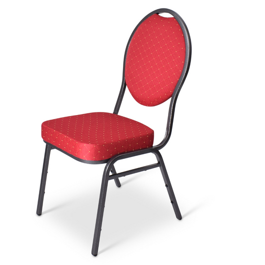 Stackchair Eindhoven. Deze stoel is makkelijk stapelbaar met een hamerslag frame. De stoffering is rood met een gouden stip.